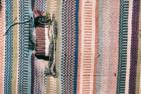 Abstract texture of a colorful blanket patchwork Stock Photos