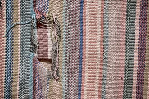 Abstract texture of a colorful blanket patchwork Stock Photos