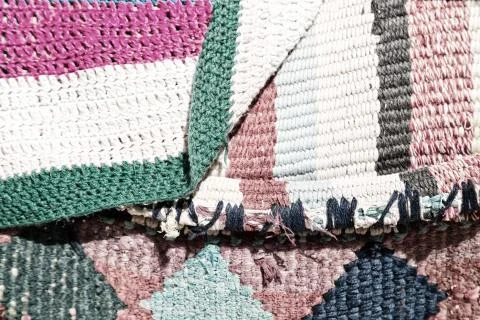 Abstract texture of a colorful blanket patchwork Stock Photos