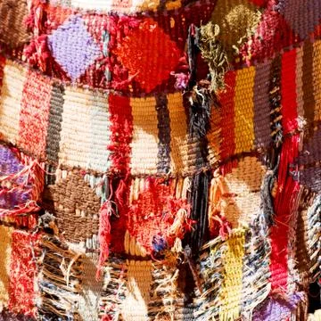 Abstract texture of a colorful blanket patchwork Stock Photos