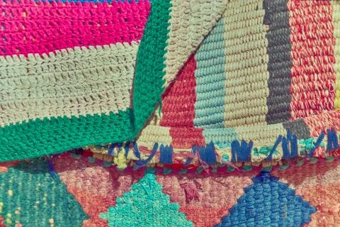 Abstract texture of a colorful blanket patchwork Stock Photos