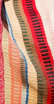 Abstract texture of a colorful blanket patchwork Stock Photos