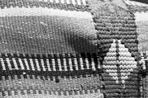 Abstract texture of a colorful blanket patchwork Stock Photos