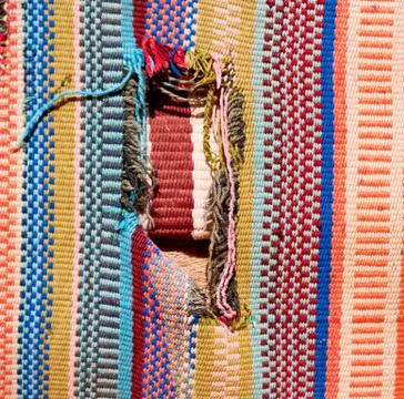 Abstract texture of a colorful blanket patchwork Stock Photos