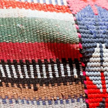 Abstract texture of a colorful blanket patchwork Foto stock