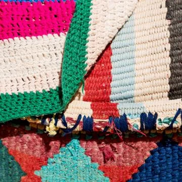 Abstract texture of a colorful blanket patchwork Stock Photos