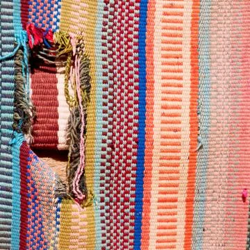 Abstract texture of a colorful blanket patchwork Stock Photos