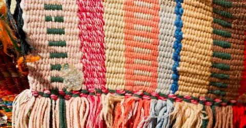 Abstract texture of a colorful blanket patchwork Stock Photos