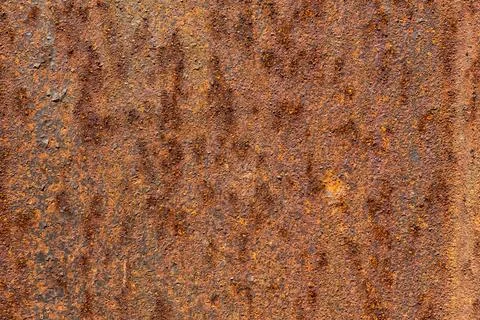 Abstract Texture of Corroded Metal Surface Featuring Subtle Rust Patterns Stockfoto's