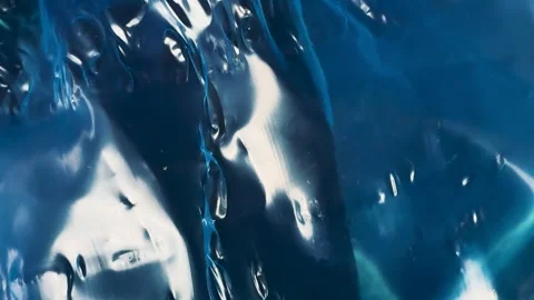 Abstract texture of crumpled blue plastic film Stock Footage 340580975