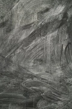 Abstract texture of dark gray surface with smooth and rough patterns Stock Photos