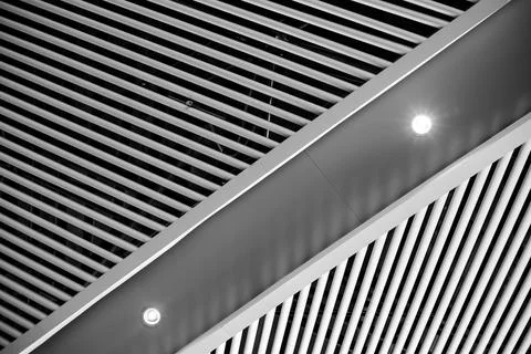 Abstract texture of diagonal lines. Iron ceilings of the high ceiling of the  Stock Photos
