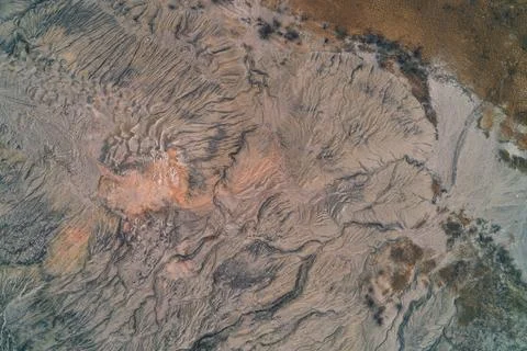 Abstract texture of eroded soil and dry ground with dendritic drainage patterns Stock Photos