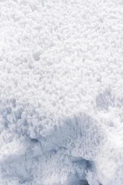 Abstract texture of melted snow with traces of drops Foto stock
