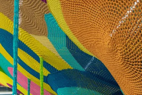 Abstract texture of multi-colored woven fabrics. Creative vintage background. Stock Photos