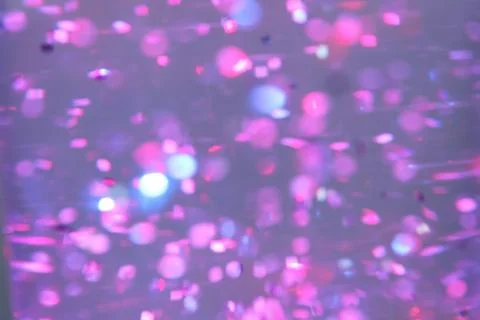 Abstract texture multicolored sequins with bokeh effect Stock Photos