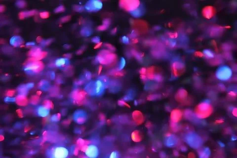 Abstract texture multicolored sequins with bokeh effect Foto stock