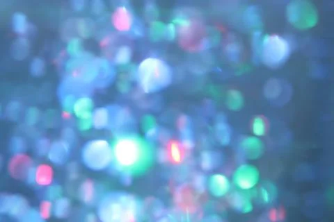 Abstract texture multicolored sequins with bokeh effect Stock Photos