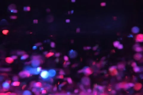 Abstract texture multicolored sequins with bokeh effect 写真素材