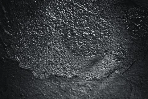 Abstract texture. Paint spots wall. Black texture. Stone background. Dark mar Stock Photos