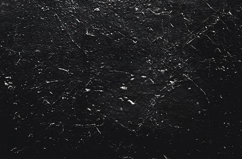 Abstract texture. Paint spots wall. Black texture. Stone background. Dark mar Stock Photos