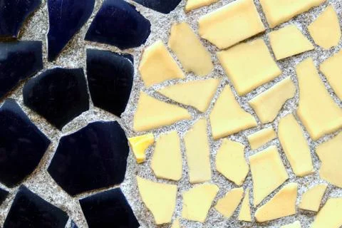 Abstract texture from pieces of shattered mosaic black and yellow Stock Photos