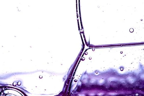 Abstract texture of purple soap bubbles closeup 写真素材