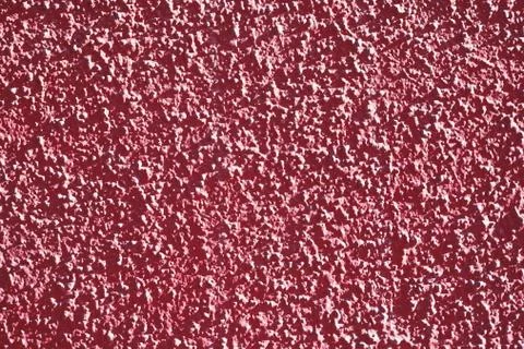 Abstract texture of the red coating of the wall Stock Photos