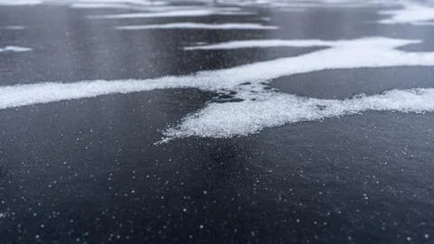 Abstract texture of river ice surface. Winter background Stock Photos