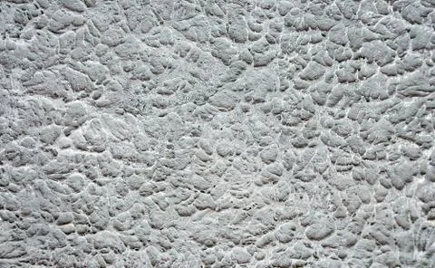 Abstract texture of a stone foundation coated with concrete Stock Photos