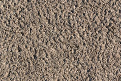 Abstract texture of a surface of the crushed sifted earth of natural color Stock Photos