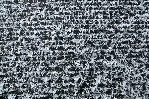 Abstract texture of tiny geometric shapes Stock Photos