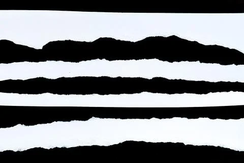 Abstract texture of torn paper with black and white horizontal stripes. Stock Photos