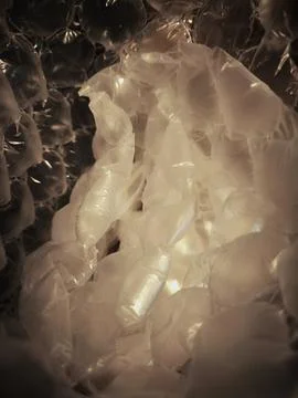 Abstract texture of transparent plastic bubble wrap. Fotos Stock