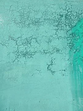 Abstract texture turquoise background with cracks and craquelure Foto stock