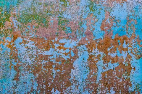 Abstract Texture of Weathered Peeling Paint in Blue and Rust Фото