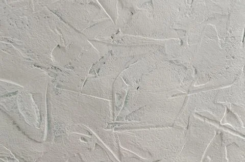 Abstract textured background: light gray putty. Imitation of surface of stone 库存照片