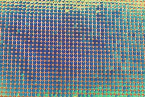 Abstract textured background, many small circles, rows, altered color scheme, Foto stock