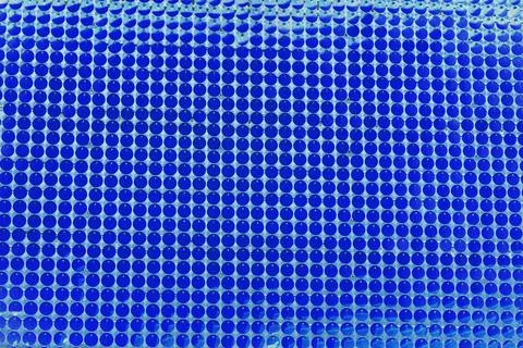 Abstract textured background, many small circles, rows, altered color scheme, 스톡 사진