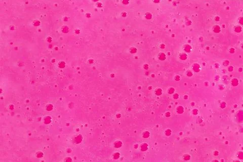 Abstract textured gradient neon background slime with air bubbles inside. Macro Foto stock