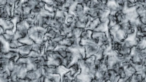 Abstract textured surface with flowing patterns in dark cool tones during s.. Stock Footage 340948292