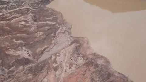 Abstract textures on the drained reservoir floor at Vidraru Dam, Romania Video stock 333266622
