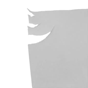 Abstract textures of scattered torn white paper fragments on a vibrant back.. Foto stock