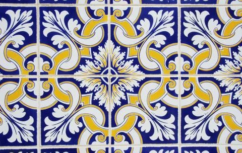 Abstract tile pattern in blue, yellow and white Foto stock