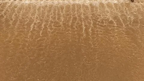 Abstract Top Down Drone View of Brown River Water Texture During Monsoon Season Stock-Fotos