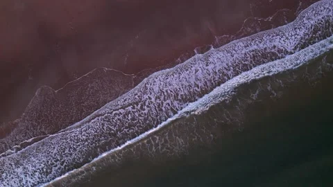 Abstract top down foamy ocean waves breaks beach Stock Footage 220917892