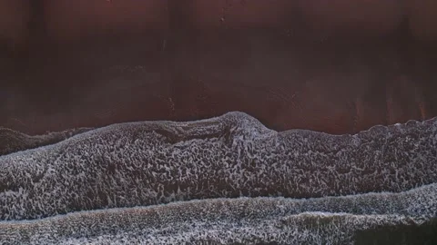 Abstract top down foamy ocean waves breaks beach Stock Footage 222047122