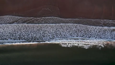 Abstract top down foamy ocean waves breaks beach Stock Footage 224914190