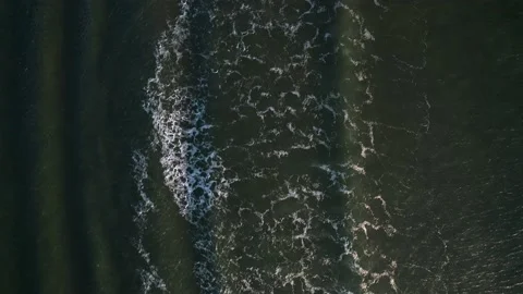 Abstract top down ocean waves in sunset Stock Footage 220688499