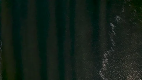 Abstract top down ocean waves in sunset Stock Footage 220917872